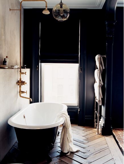 melanie acevedo dark bathroom stand alone tub
